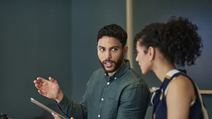 a man and a woman sitting at a table