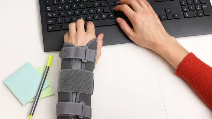 a pair of hands on a keyboard