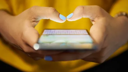 a person holding a phone