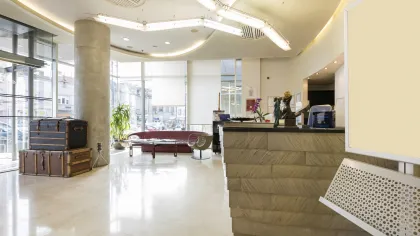 a large room with a couch and a table