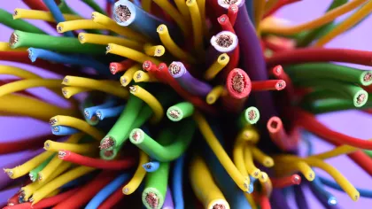 a pile of colored pencils