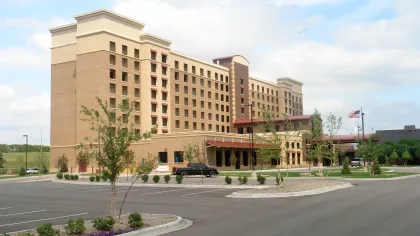 a large building with a parking lot