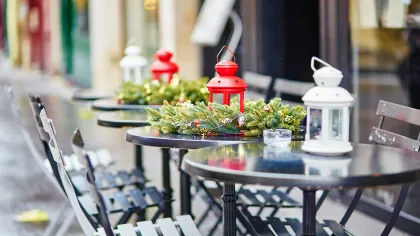 a table with a fire hydrant and flowers on it