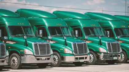 a row of green trucks