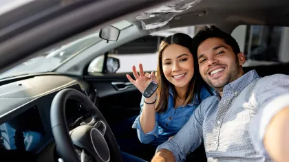 a man and woman in a car