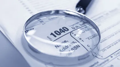 a close-up of a calculator on a piece of paper