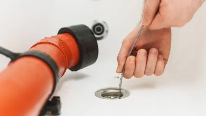 a hand holding a key