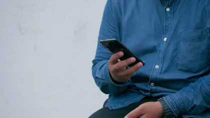 a person holding a phone