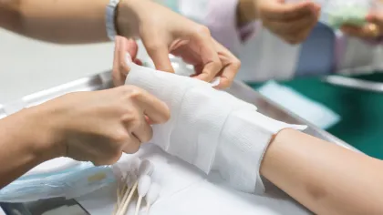 a close-up of hands shaking