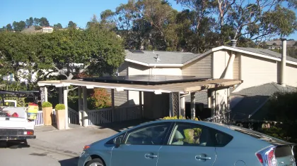 a car parked in front of a house