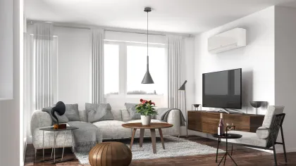 a living room with a tv and couches