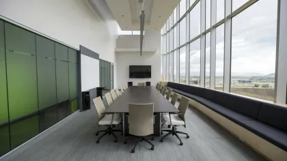 a room with a table and chairs