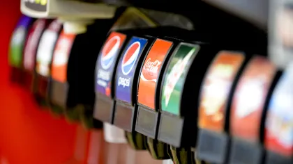a close up of a soda fountain dispensers