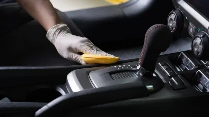 a person sponging the interior