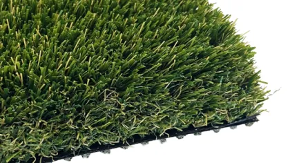 Close-up of green artificial grass turf with black backing on white background.