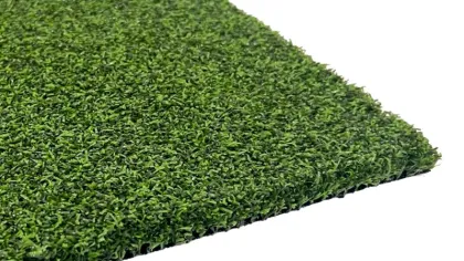 Close-up view of a green artificial grass mat with dense and even texture on a white background.
