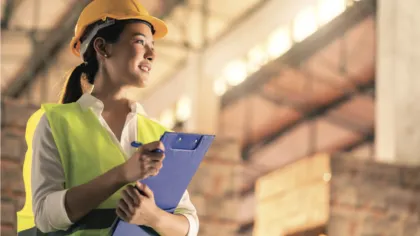 a woman in a construction uniform