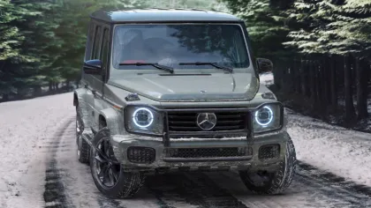 a jeep driving on a dirt road