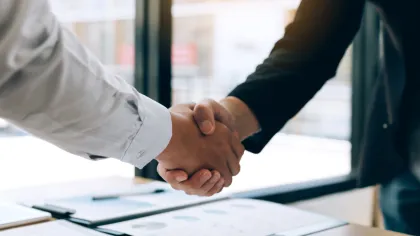 a close-up of a handshake