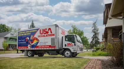 a white truck parked in a driveway