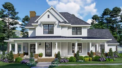 a white house with a large front yard
