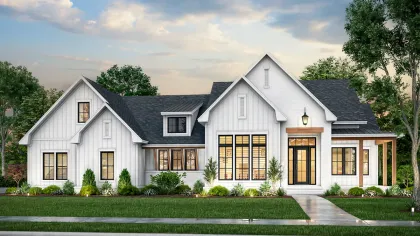 a white house with a driveway