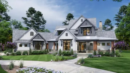 a large white house with a driveway