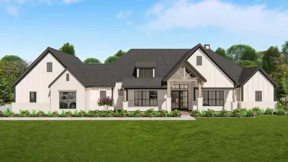 a large house with a lawn in front of it