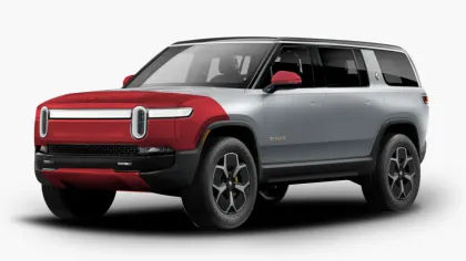 Silver and red Rivian electric SUV with black wheels on a white background