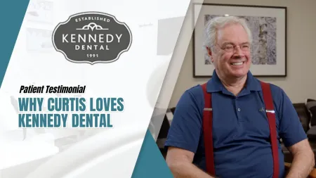Smiling elderly man shares a positive testimonial about Kennedy Dental in a bright dental office setting.