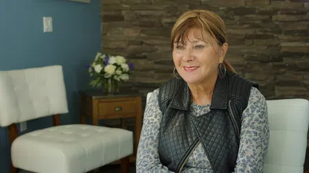 Floranne B. on her emergency visit and subsequent dental implant