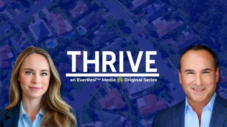 Two professionals smiling with a suburban neighborhood aerial view and the word THRIVE centered between them.