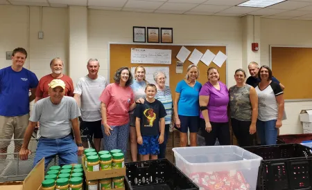 Image for Volunteers work to reduce student hunger