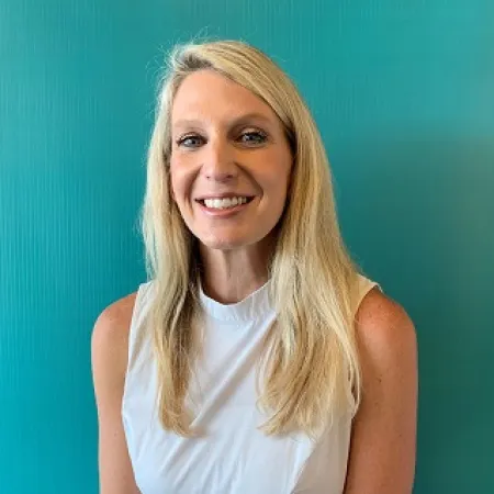 a woman smiling for the camera