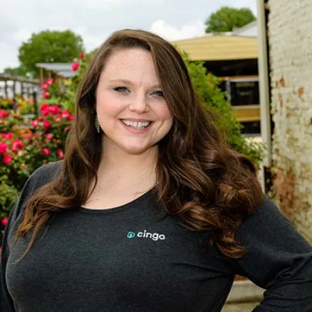 a woman smiling outside