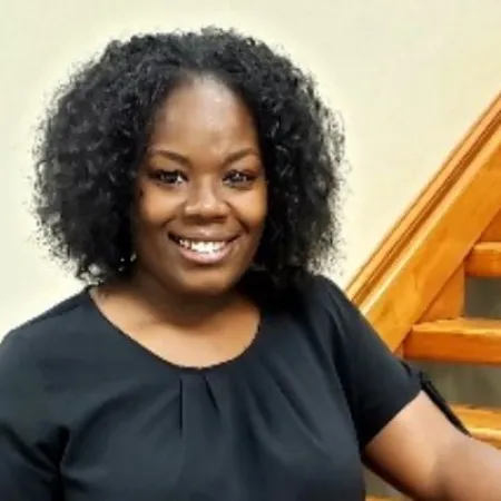 a person smiling at the camera