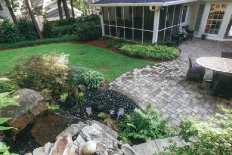 a garden behind a house