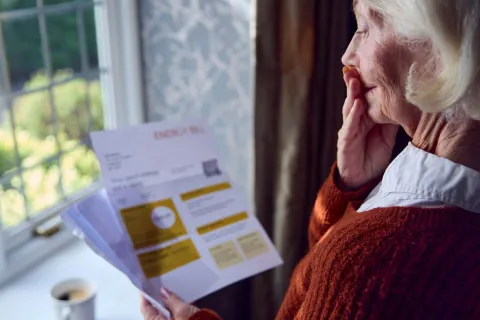 a senior getting bills
