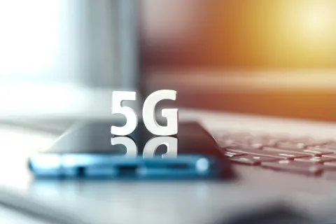 a close up of a phone with 5G