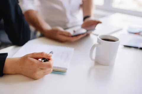 a few people working at a table