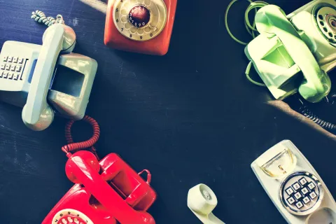 a group of telephones on a table