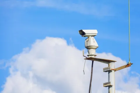 a white surveillance camera