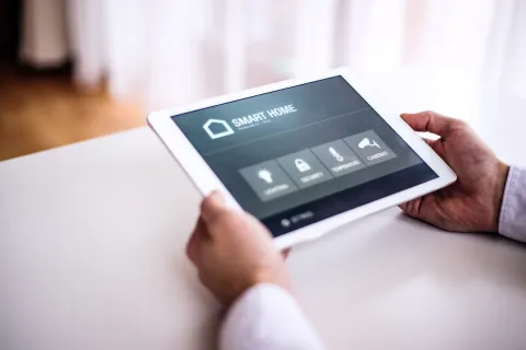 a person holding a tablet