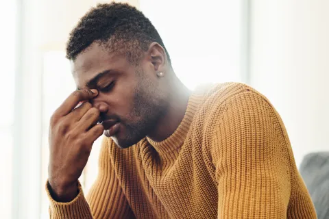 a man sitting on a couch
