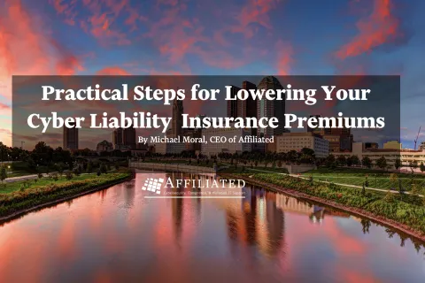 a body of water with buildings and grass around it