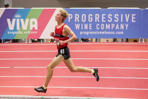 a woman running on a track