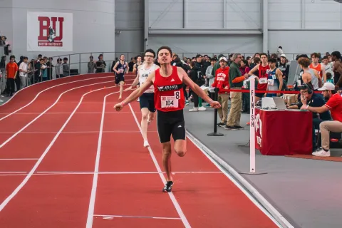 a woman running on a track