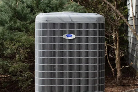 a metal container with a blue circle in the middle