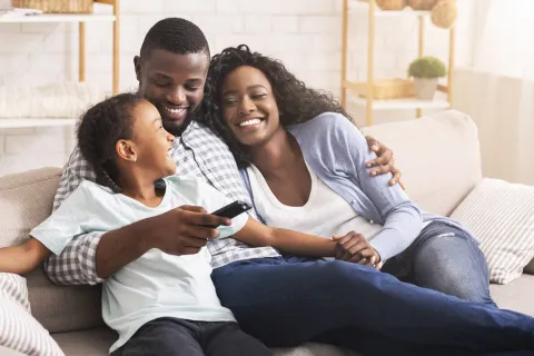 a man and a woman sitting on a couch