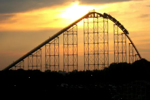 a large bridge with a sunset
